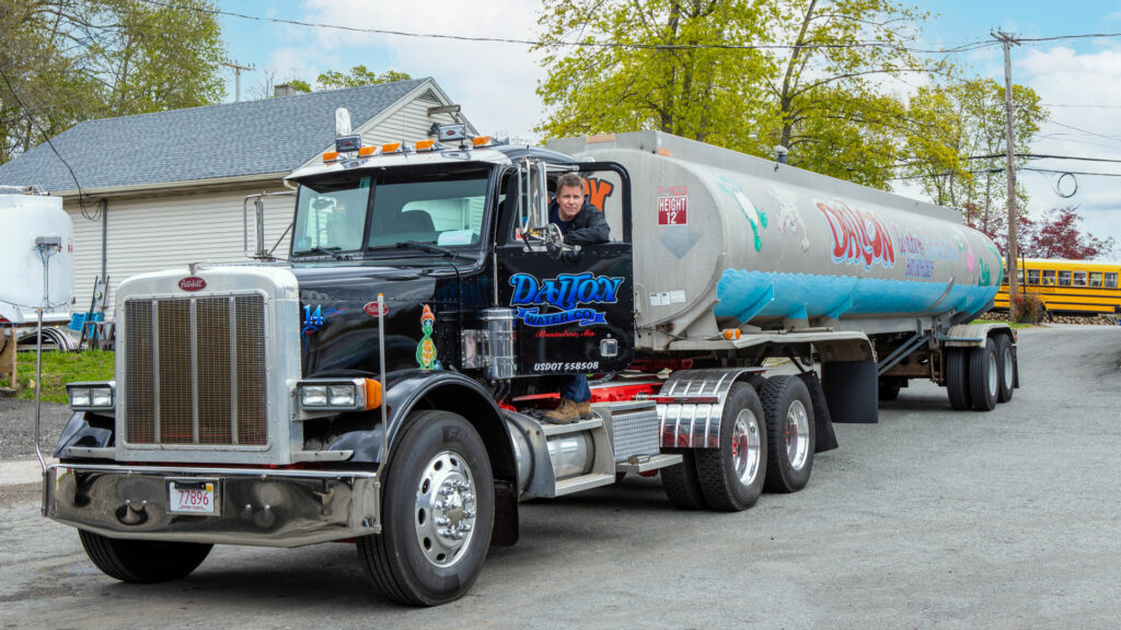 Joe Dalton, Owner of Dalton Water poses with his water tanker truck.